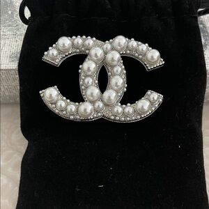 CHANEL Silver Brooch with Pearl Accents